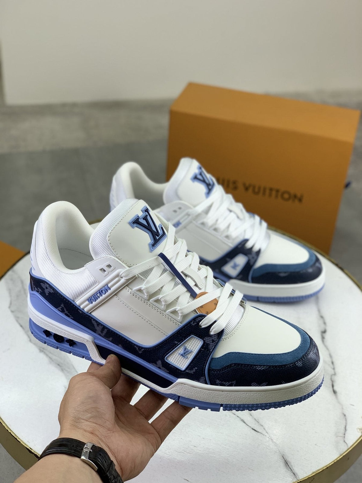 Louis Vuitton White and Navy Blue Sneakers — model